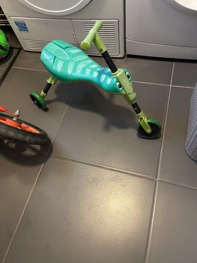 Two toddler bikes and a balance bike