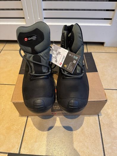 Steel toe safety boots.