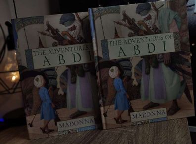 The Adventures of Abdi ! by Madonna ! Illustrated by Olga and Andrej Duda ! 2004 ! by Puffin Books !
