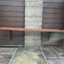 Wall mounted outdoor plastic composite bench with a rust resistant frame Image 3