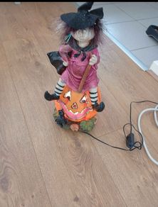 Halloween Fibre optic witch sitting on pumpkin