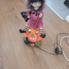 Halloween Fibre optic witch sitting on pumpkin