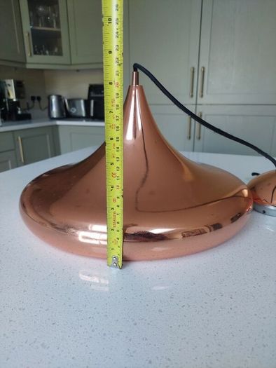 Copper pendant ceiling light. Lovely shape.