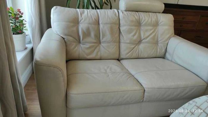 Two-seater cream leather sofa