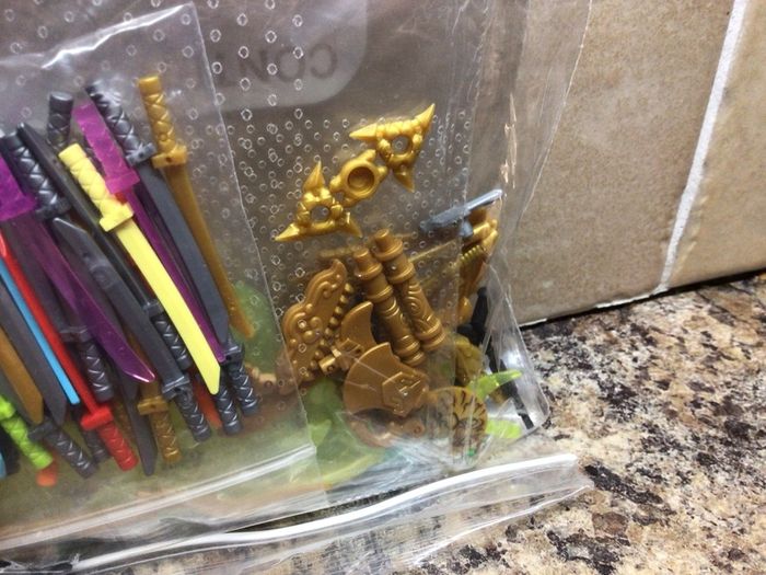 Mix bag of Lego weapons /swords