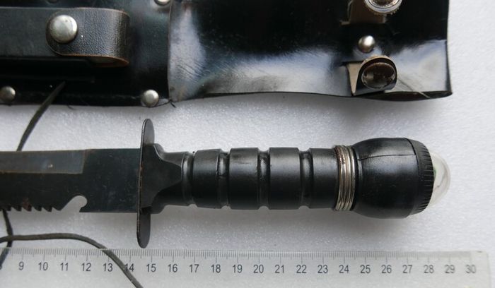 Vintage 1980s Survival Knife with compass and a storage compartment in the knife handle