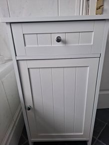 Small white freestanding bathroom cabinet