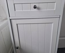 Small white freestanding bathroom cabinet