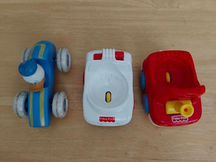 Vintage Fisher Price and Brio Donald Duck Car.