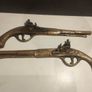 A pair of Early 20th Century 13" Brass Flintlock pistols Image 3