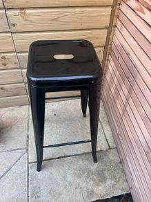 Black metal stool