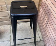 Black metal stool