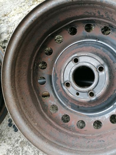 2 x steel rims 15", 4 stud, about 114mm ish from hole centre to the opposite home centre... Possibly fit a nissan etc