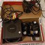 Nintendo GameCube. Controllers x2. Memory card x2. Games x9. Image 2