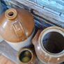 Collection of Eight Antique Stoneware Jars including Two Antique Hot Water Bottles Image 4
