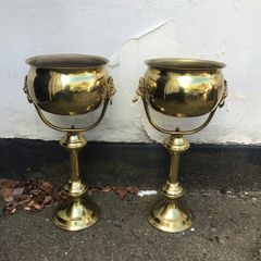 Tall pair of  Brass jardinieres planters on pedestals.
