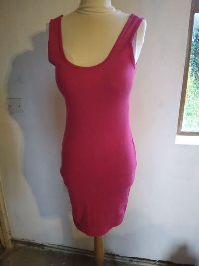 Stretch Dress,figure hugging.Size 12 Brand New.