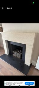 Sandstone fireplace and hearth