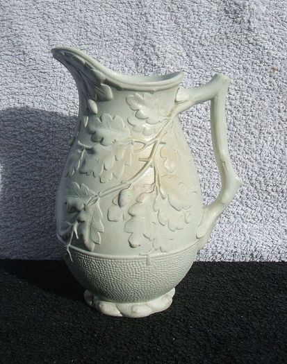 An antique Parian-bisque jug with moulded oak leaves & acrons pattern (c.1870)