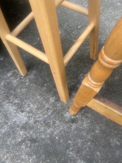 2 solid wood bar stools.