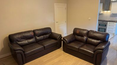 2 Brown Leather Couches
