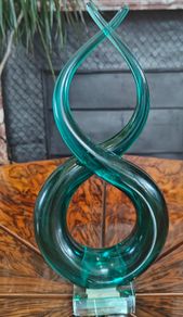 Teal knotted glass sculpture