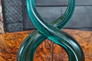 Teal knotted glass sculpture