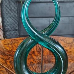Teal knotted glass sculpture