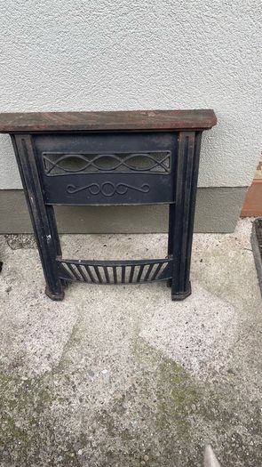 Two cast iron fire surrounds