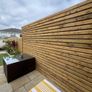 wall cladding with bench and flower boxs Image 4