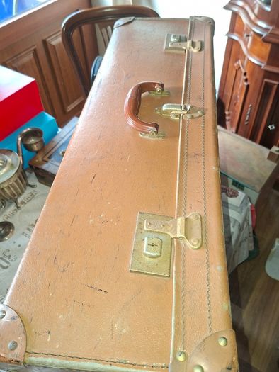 Vintage Hard Travel Suitcase, 1940s to 1950s, featuring a rigid textured brown exterior, metal corner guards, and a molded carry handle, Measurements are in the photo's, Postage Available or Collection