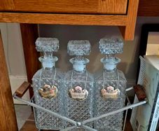 Vintage decanter with mid century holder