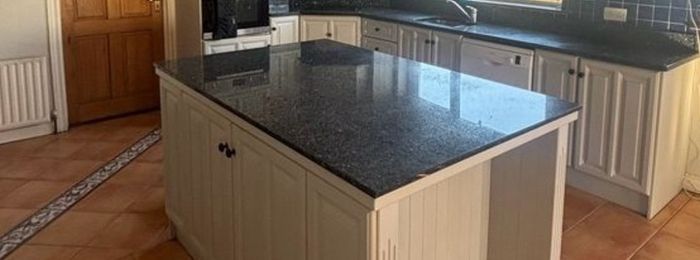 Black granite top removed from kitchen island