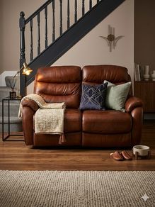 Sofa -As new.. Leather, electric recliner