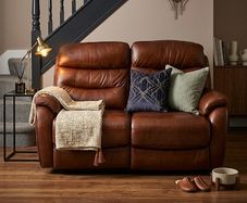 Sofa -As new.. Leather, electric recliner