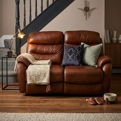 Sofa -As new.. Leather, electric recliner