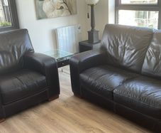 Brown leather, two seater sofa and chair
