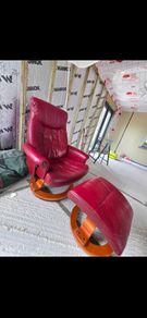 Red leather chair and footstool