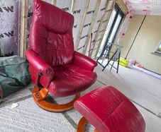 Red leather chair and footstool