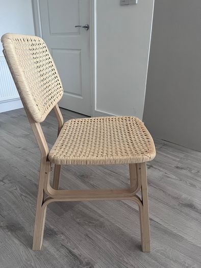 Four Voxlov IKEA light bamboo dining chairs
