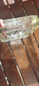 Guinness vintage heavy pressed glass ashtray,,,collectors item, unusual with clear glass ,guinness logo on the 4 sides ,,see pictures for condition, sold as seen ,