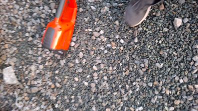 Husqvarna battery powered pole hedge trimmer