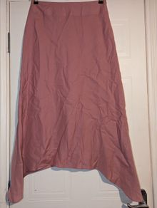 Perfect for Summer. Gorgeous, dusky pink, dipped hem midi skirt from Monsoon.