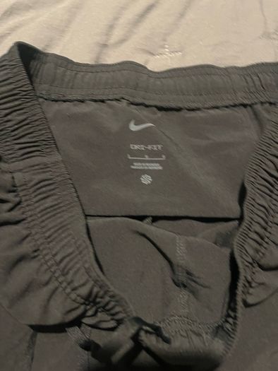 Nike Dri-FIT UV Challenger Men s Woven Hybrid Running Pants Nike Bottoms running pants size large