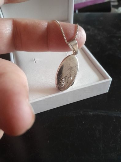 silver chain and locket