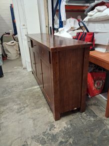 Solid track sideboard