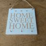 rustic wooden "Home Sweet Home" plaque  decorative wall art piece  small heart motifs, and metal hooks for keys Image 3