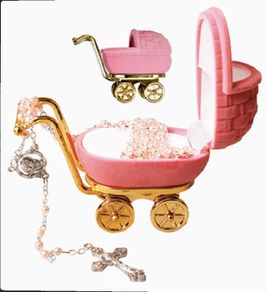 pink rosary beads in pram