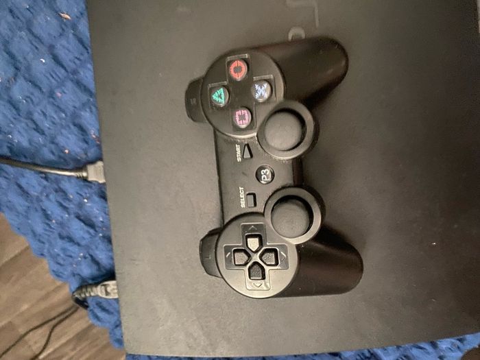 black Sony PlayStation 3 Slim