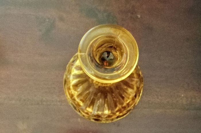 Pair of Vintage Amber Glass Candlestick Holder with Cut Glass Design.